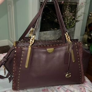 Coach leather and suede satchel. Color is a beautiful Oxblood.